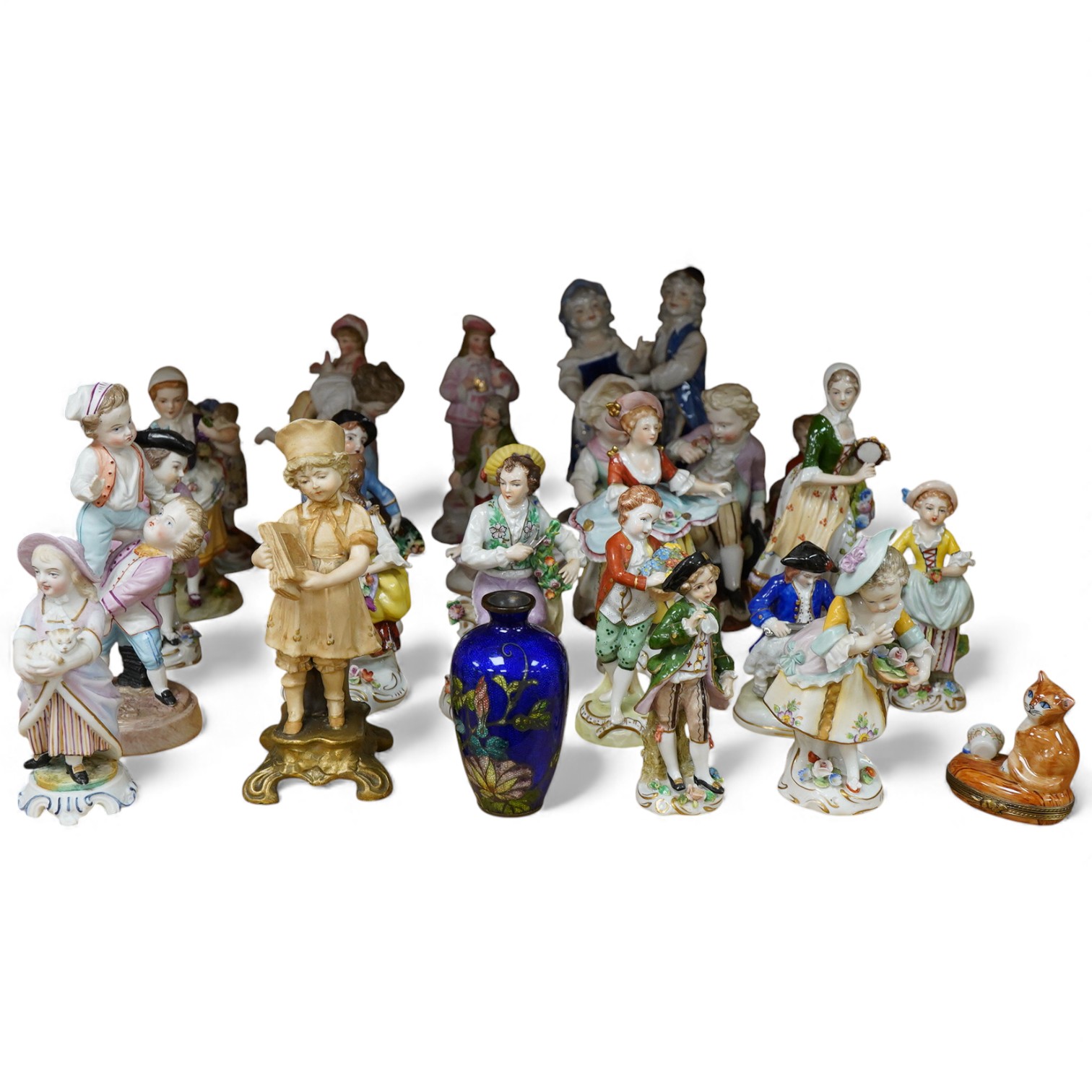 A group of german porcelain figures to include Sitzendorf, together with a Limoges pill box in the form of a cat, largest 17cm high